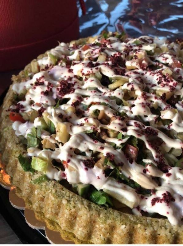 Falafel cake with tahini sauce كيكة الفلافل بصوص الطحينية