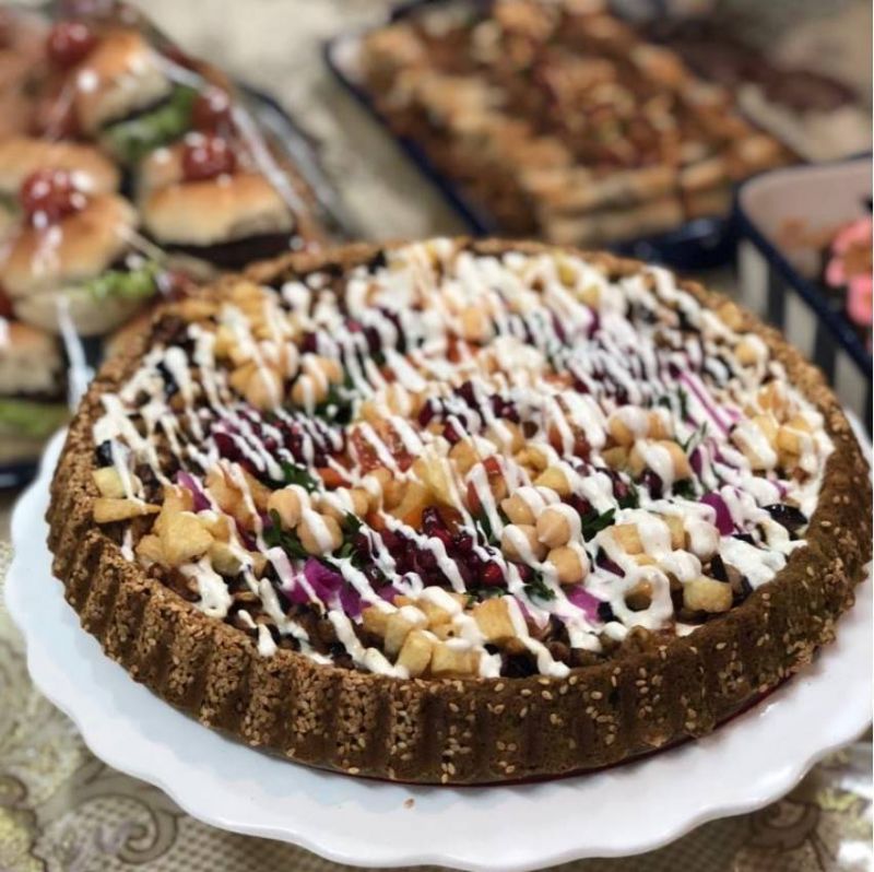 Falafel cake with tahini sauce كيكة الفلافل بصوص الطحينية